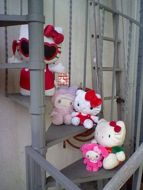 hello kitty plushs on a spiral staircase